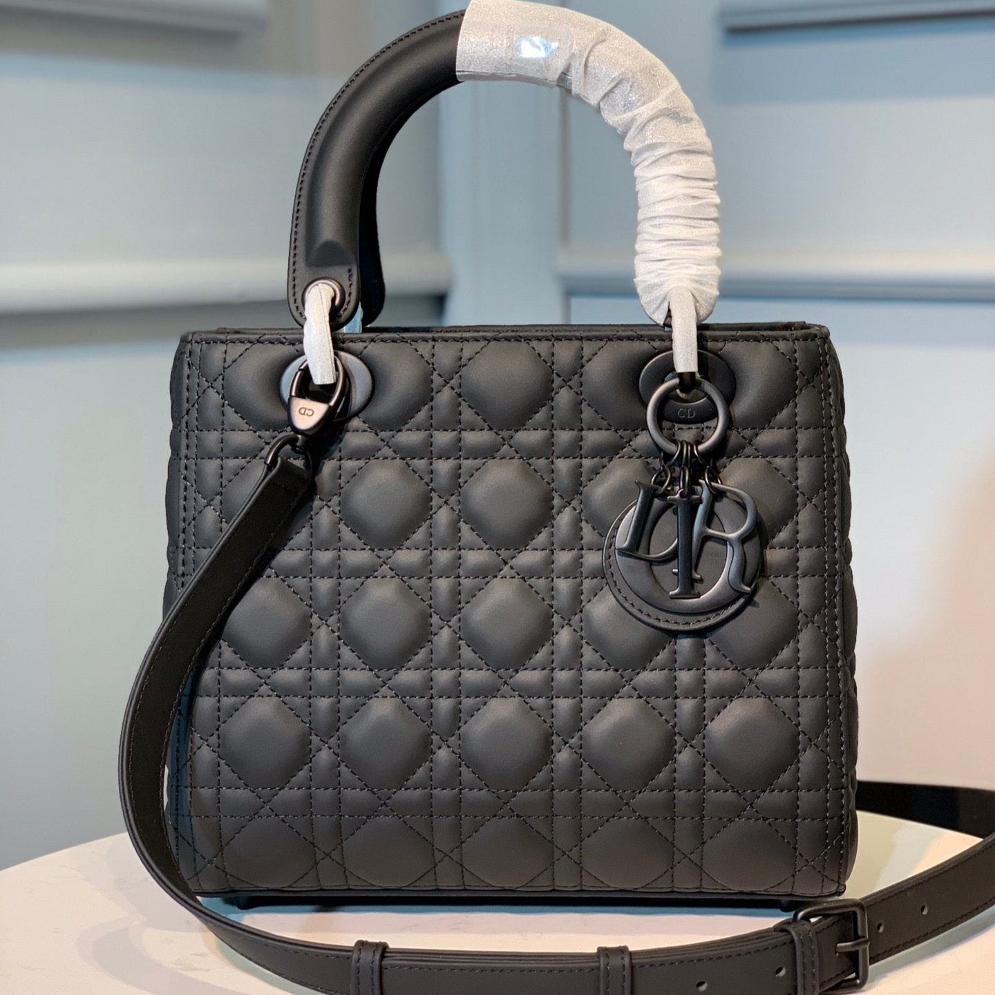 medium lady 24 black calfskin black hardware