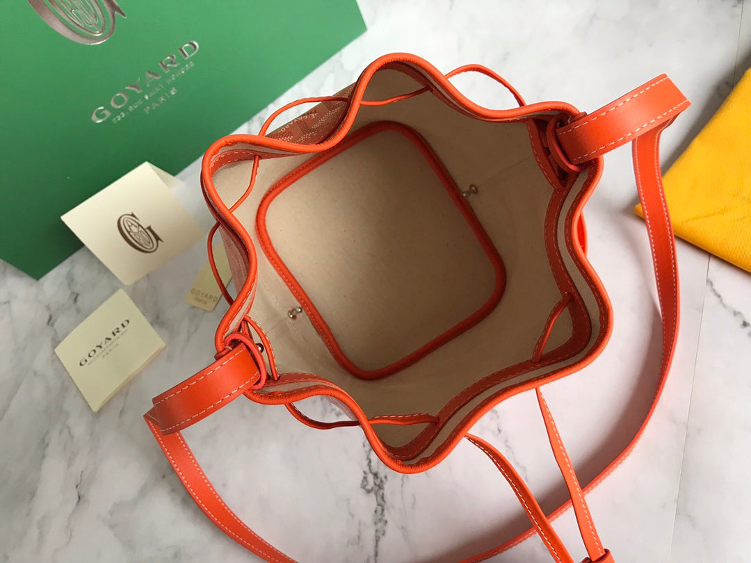 PETIT FLOT BUCKET BAG 22 IN ORANGE GOYARDINE CANVAS AND LAMBSKIN TRIM