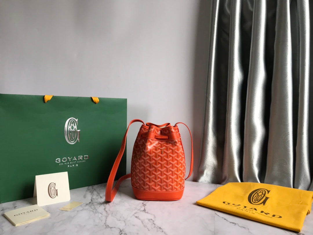 PETIT FLOT BUCKET BAG 22 IN ORANGE GOYARDINE CANVAS AND LAMBSKIN TRIM