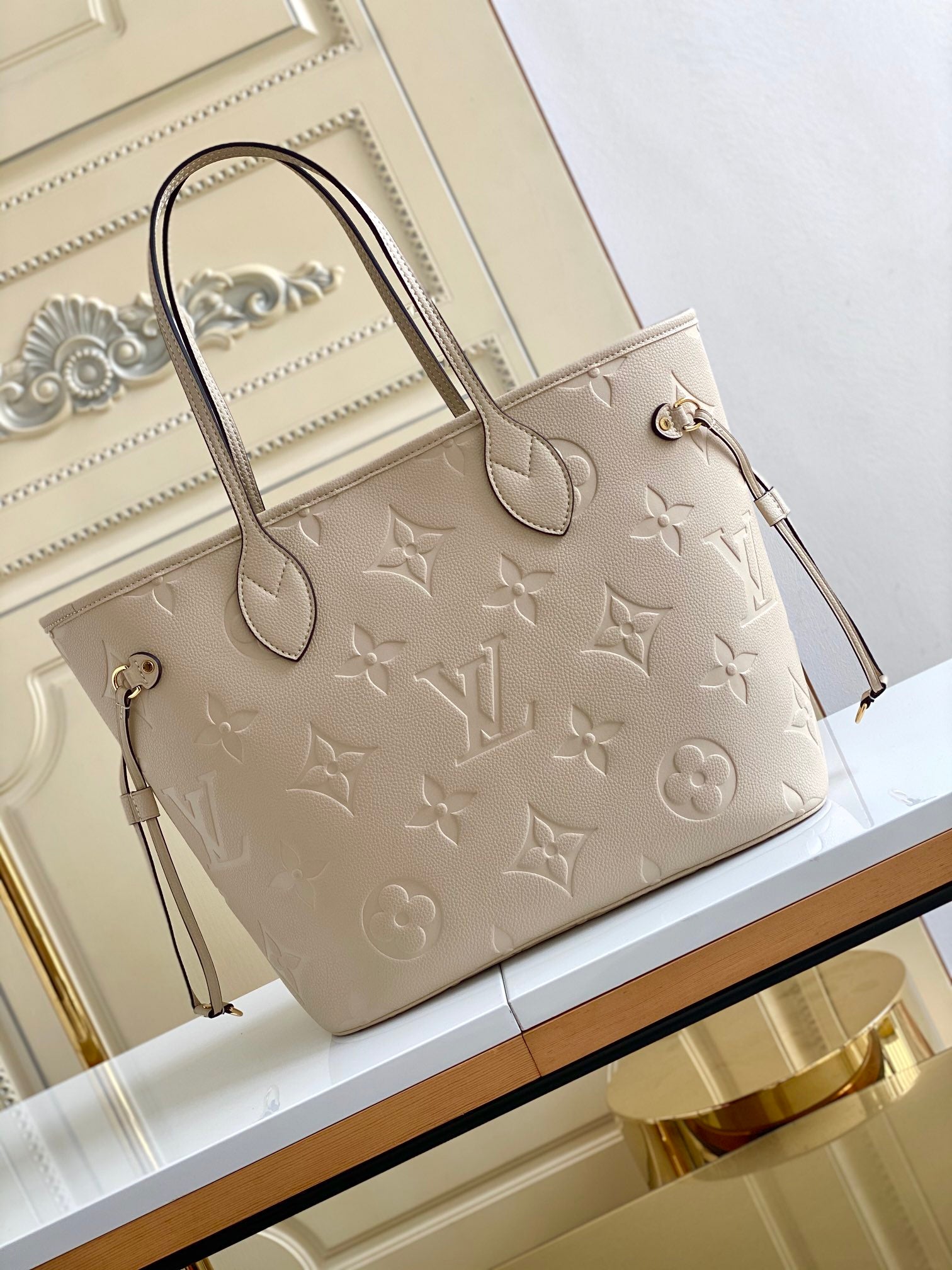 NEVERFULL MM 32 TOURTERELLE GRAY MONOGRAM EMPREINTE LEATHER