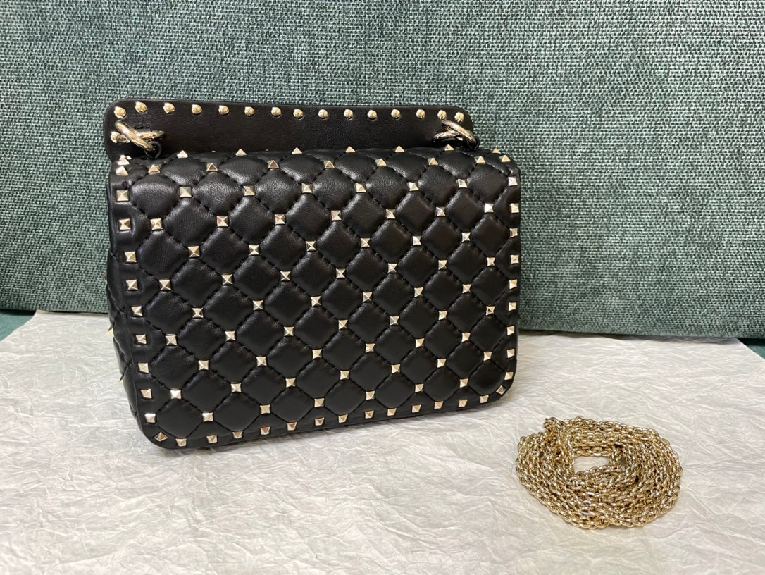 garavani rockstud spike medium 24cm black lambskin gold hardware