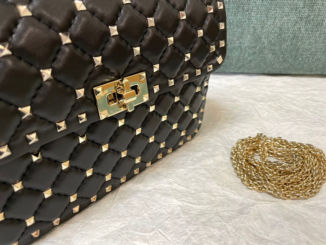 garavani rockstud spike medium 24cm black lambskin gold hardware