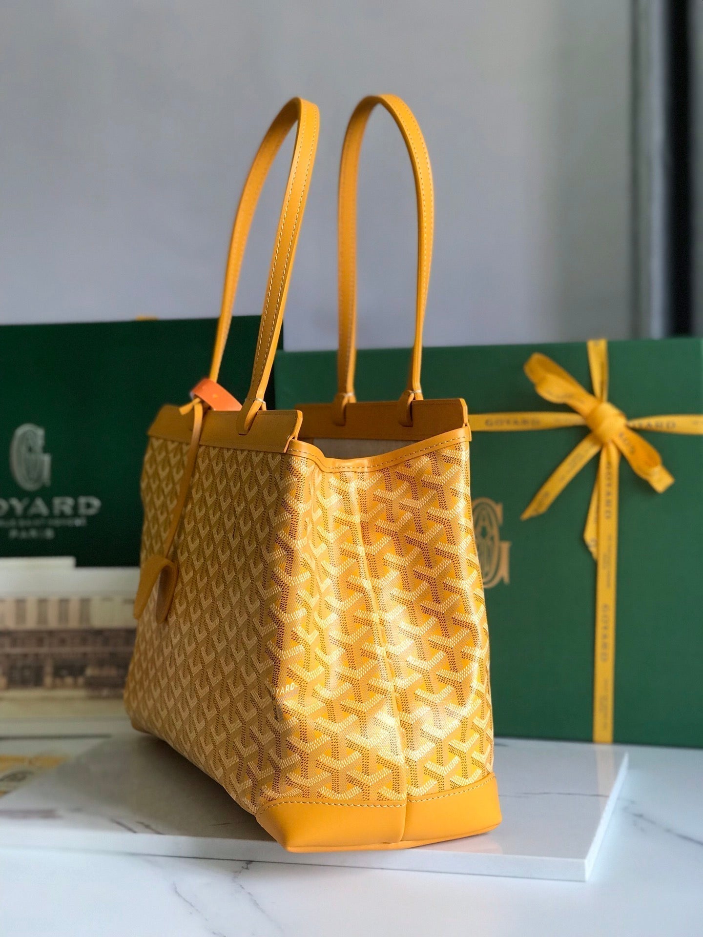BELLECHASSE BIAUDE PM BAG 36 IN YELLOW GOYARDINE CANVAS AND CALFSKIN TRIM