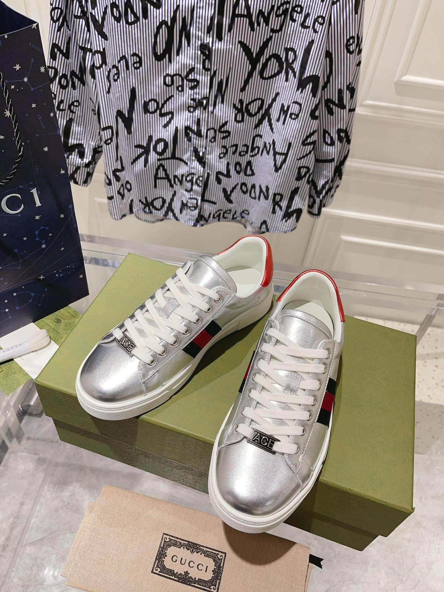 GG ACE GG SUPREME TRAINER SILVER CALFSKIN