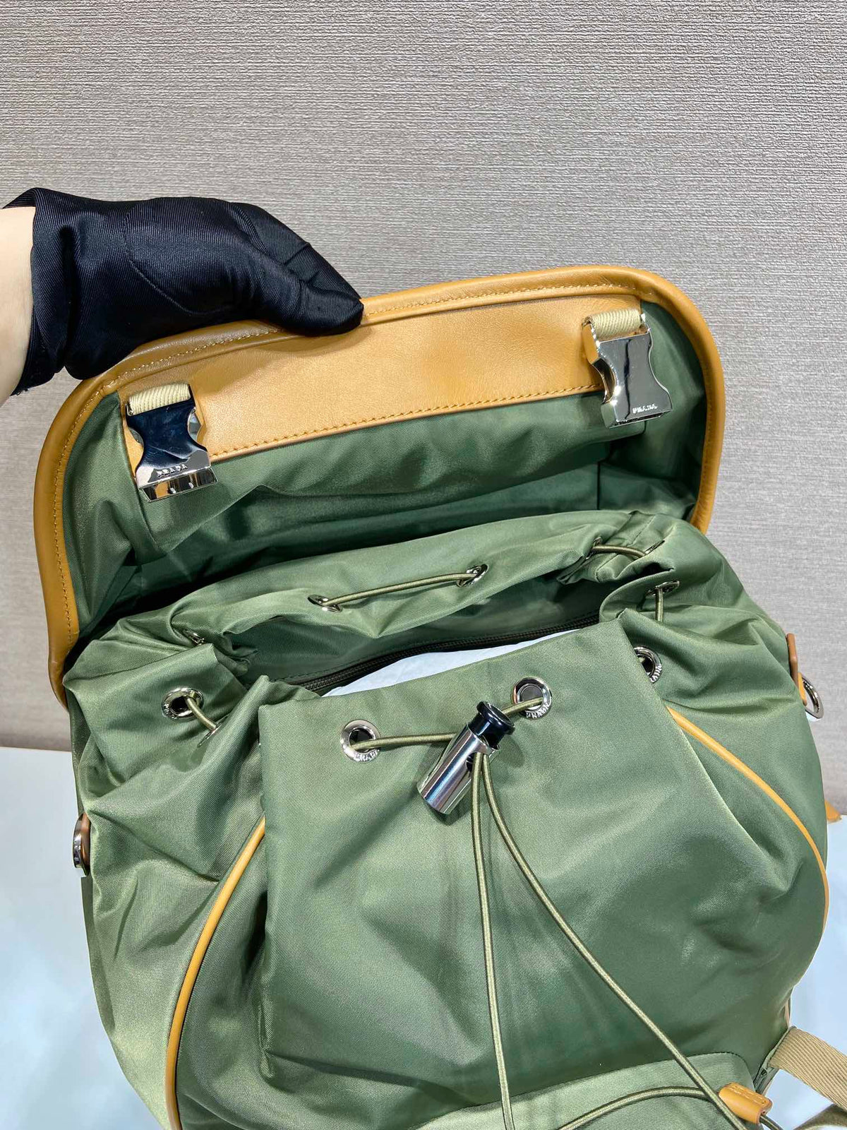 BACKPACK 45 IN SEAWEED GREEN RE-NYLON AND BROWN CALFSKIN TRIM