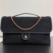Chanel 2025 Maxi Flap Bag With Top Handle 56cm Black Wool Leather