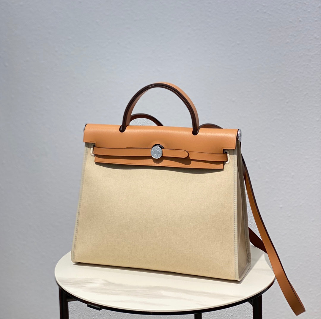 Herbag 31 Toile Light Beige Canvas Gold Cowhide Leather