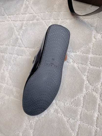 ALAIA CRISS CROSS BALLET FLAT IN BLACK LAMBSKIN WITH SILVER HARDWARE