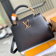 CAPUCINES BB 27 BLACK TAURILLON GOLD HARDWARE