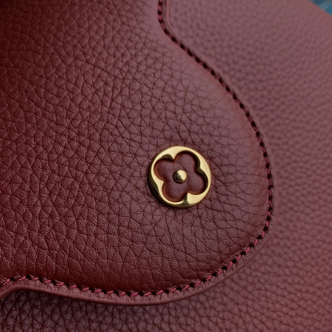 capucines mm 31.5 burgundy taurillon leather gold hardware