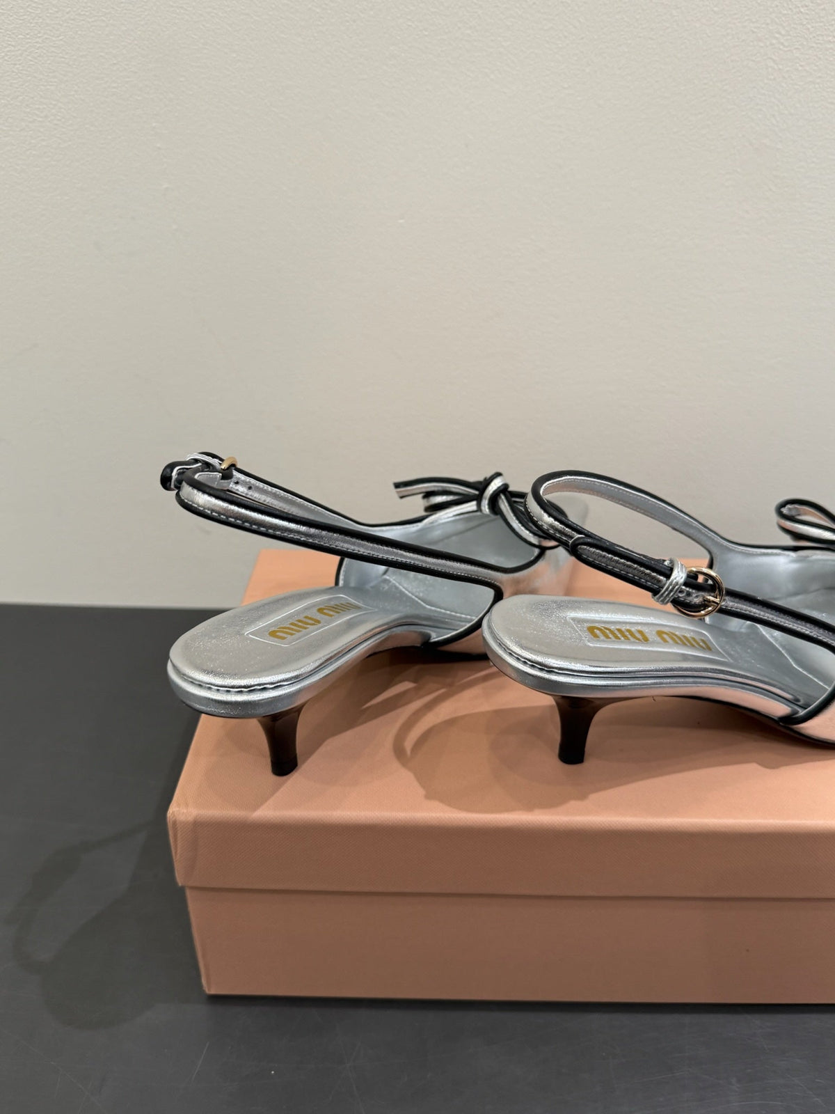 Miu slingback pump metallic sliver leather