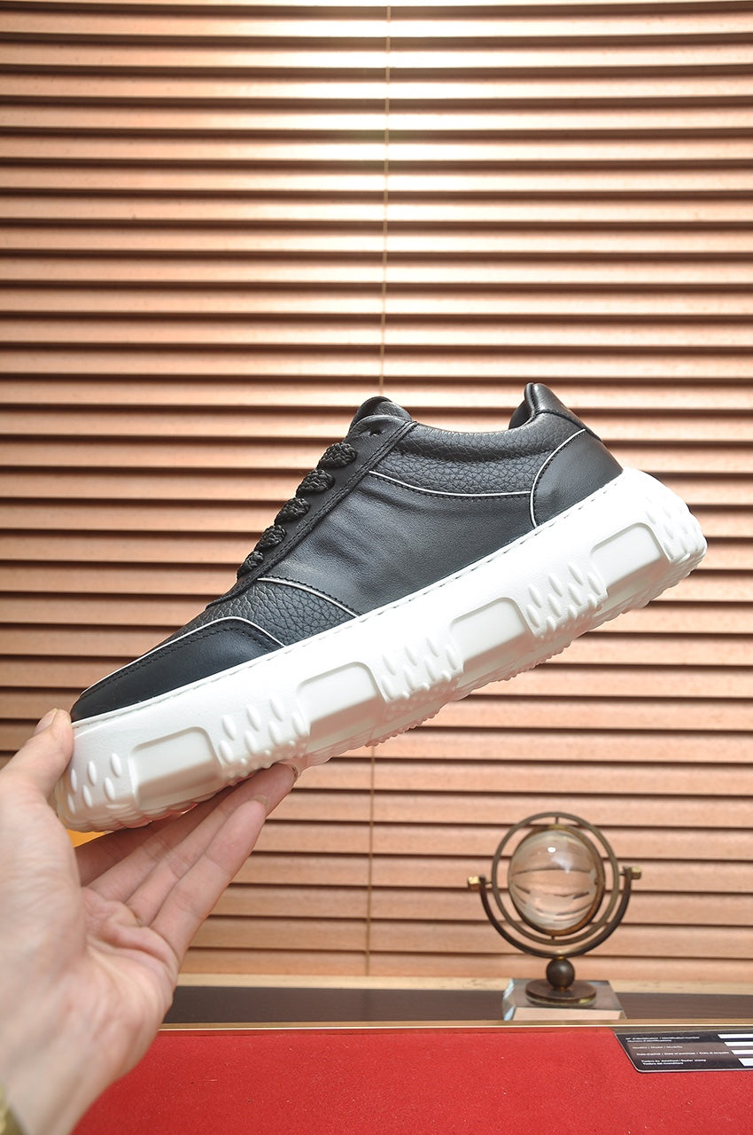 LV TRAINER BLACK MONOGRAM CALFSKIN
