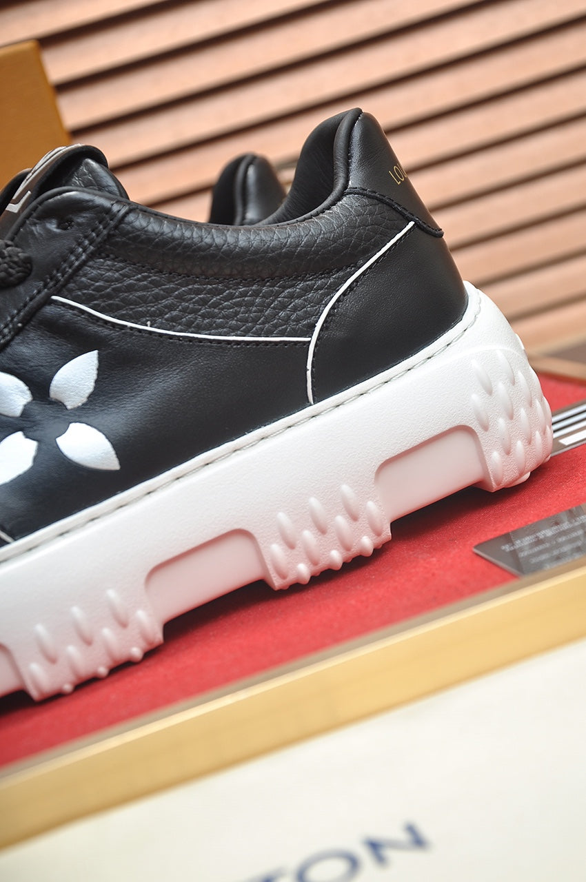 LV TRAINER BLACK MONOGRAM CALFSKIN