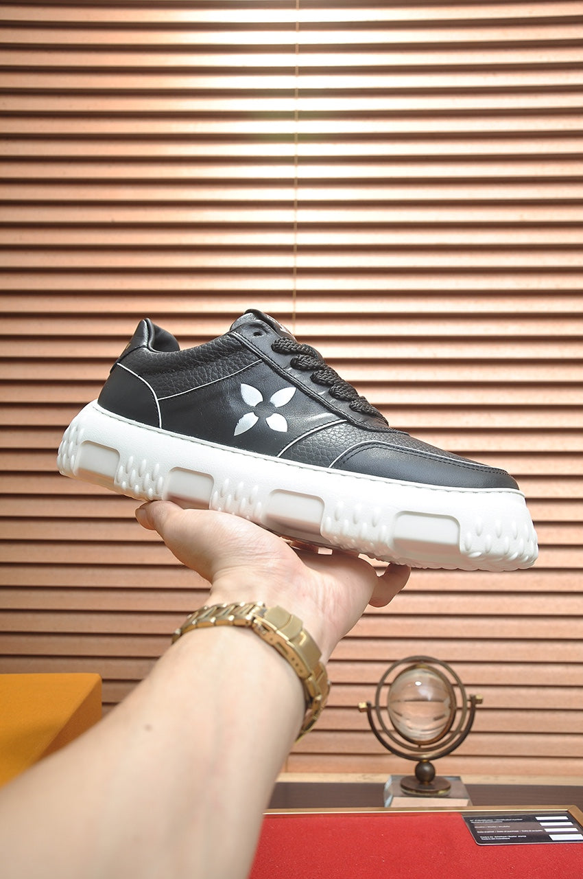 LV TRAINER BLACK MONOGRAM CALFSKIN