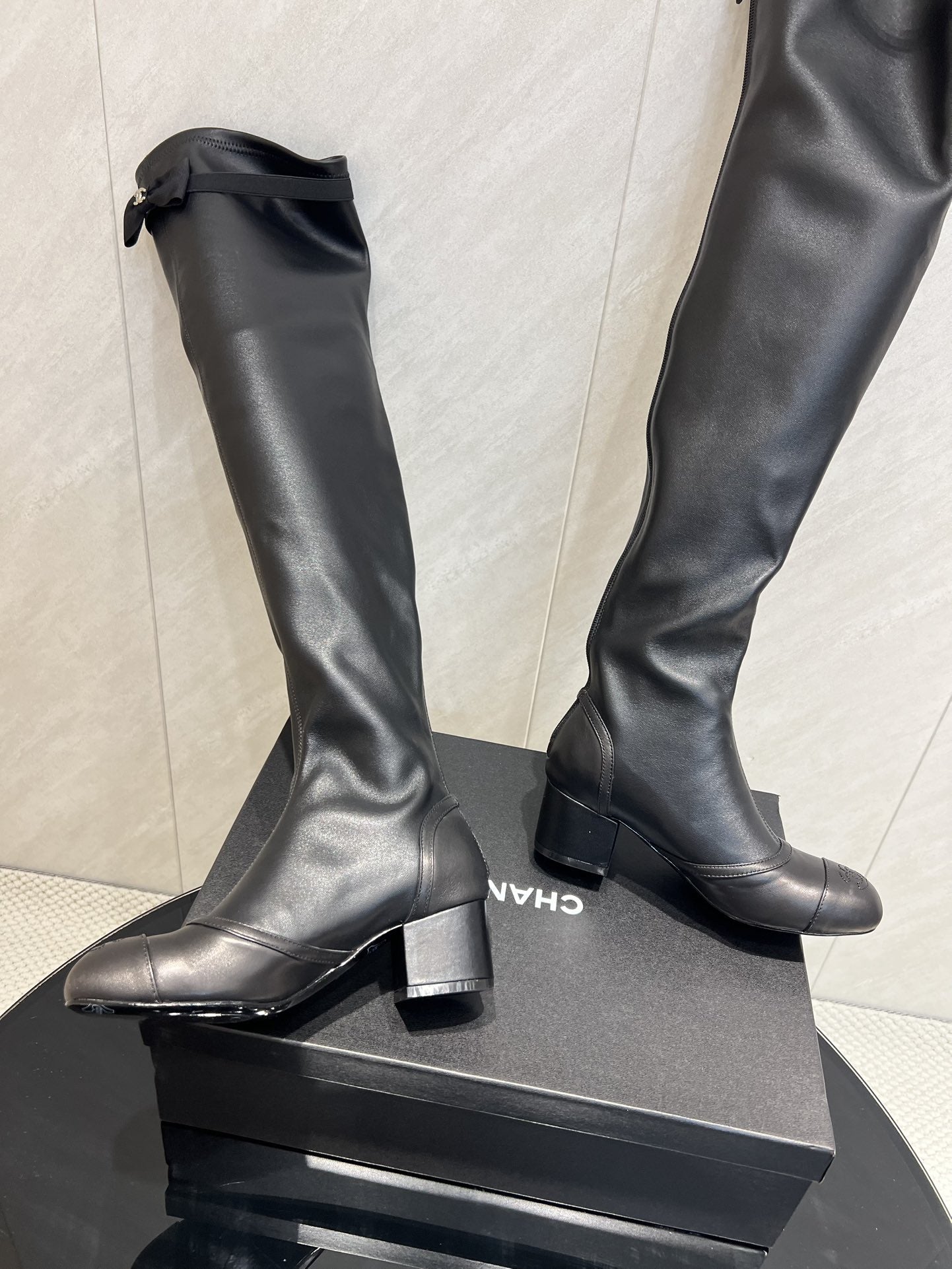 CC 25 Bowknot Stretch Boots Black Sheepskin 516420