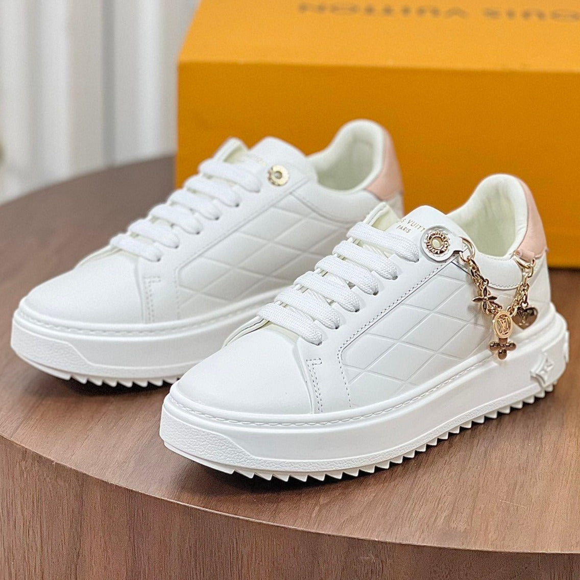 LV TIME OUT SNEAKER WHITE CALFSKIN WITH SIGNATURE CHARMS