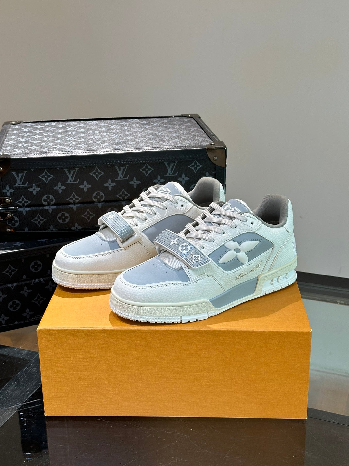 LV TRAINER SNEAKERS IN WHITE CALFSKIN AND LIGHT BLUE SUEDE