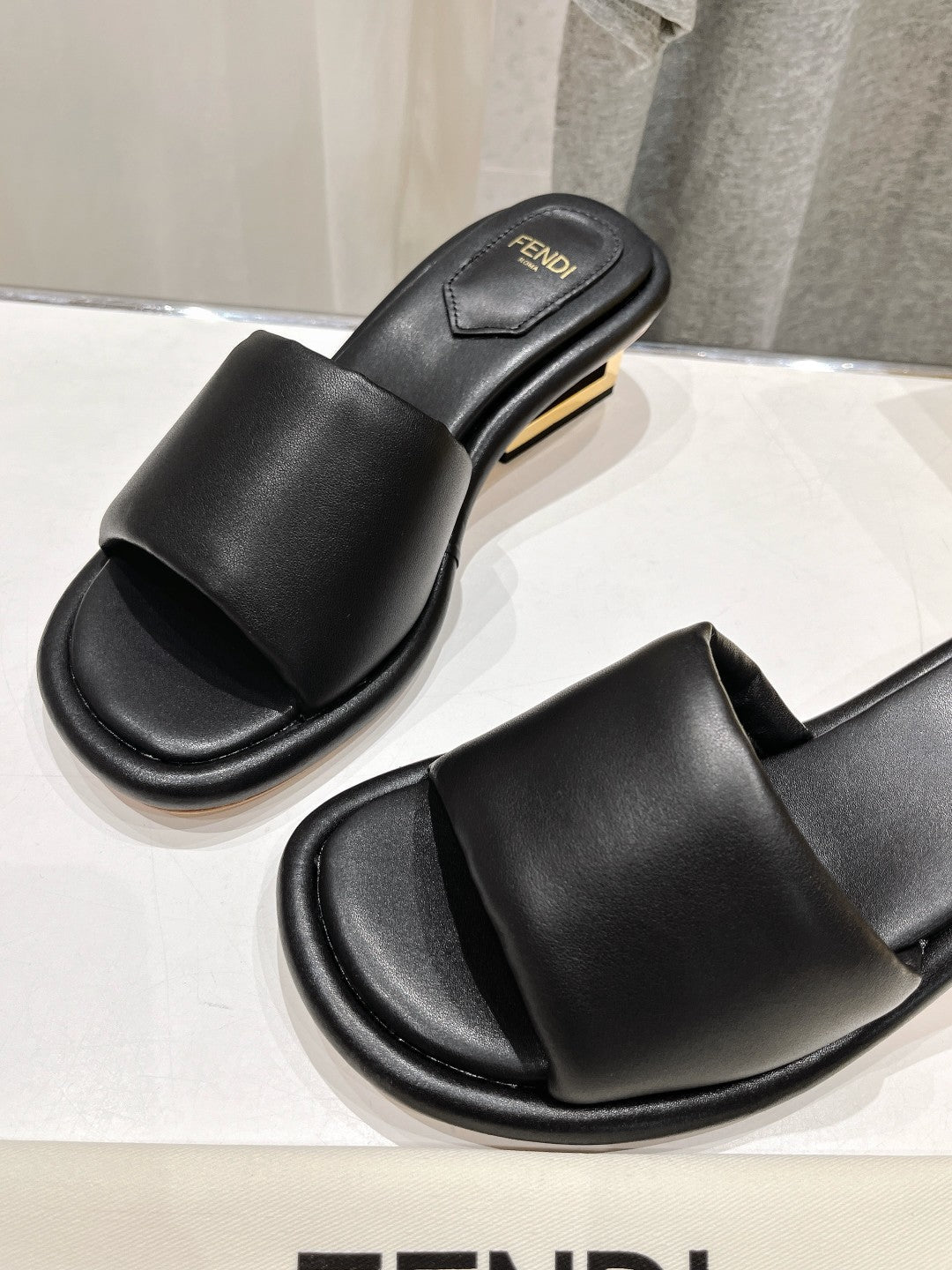 FENDI BAGUETTE MEDIUM-HEEL SANDALS 45 MM IN BLACK CALFSKIN